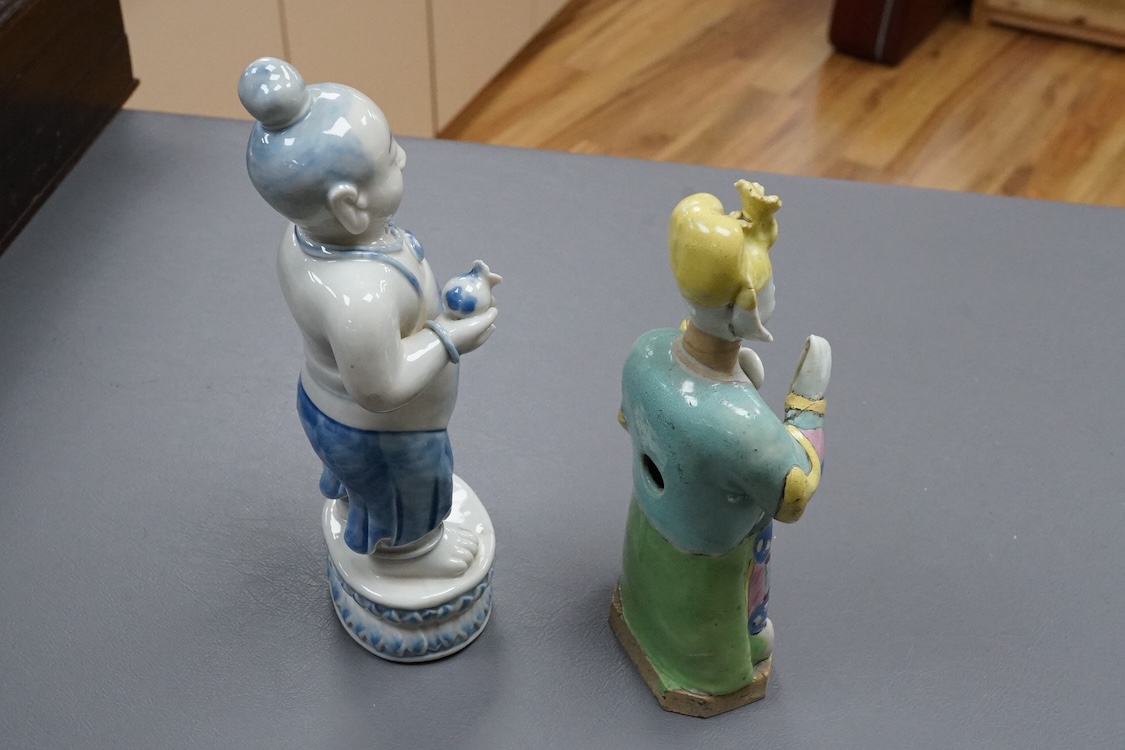 A Chinese enamelled porcelain figure of an immortal, Jiaqing period and a Japanese blue and white figure, tallest 20.5cm